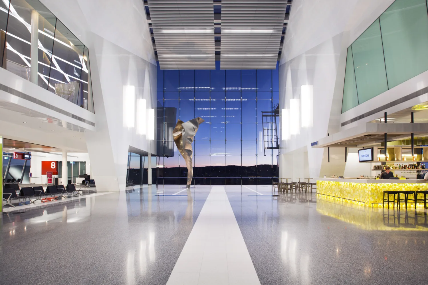 Canberra Airport interior with glass façade and shopping and restaurant area