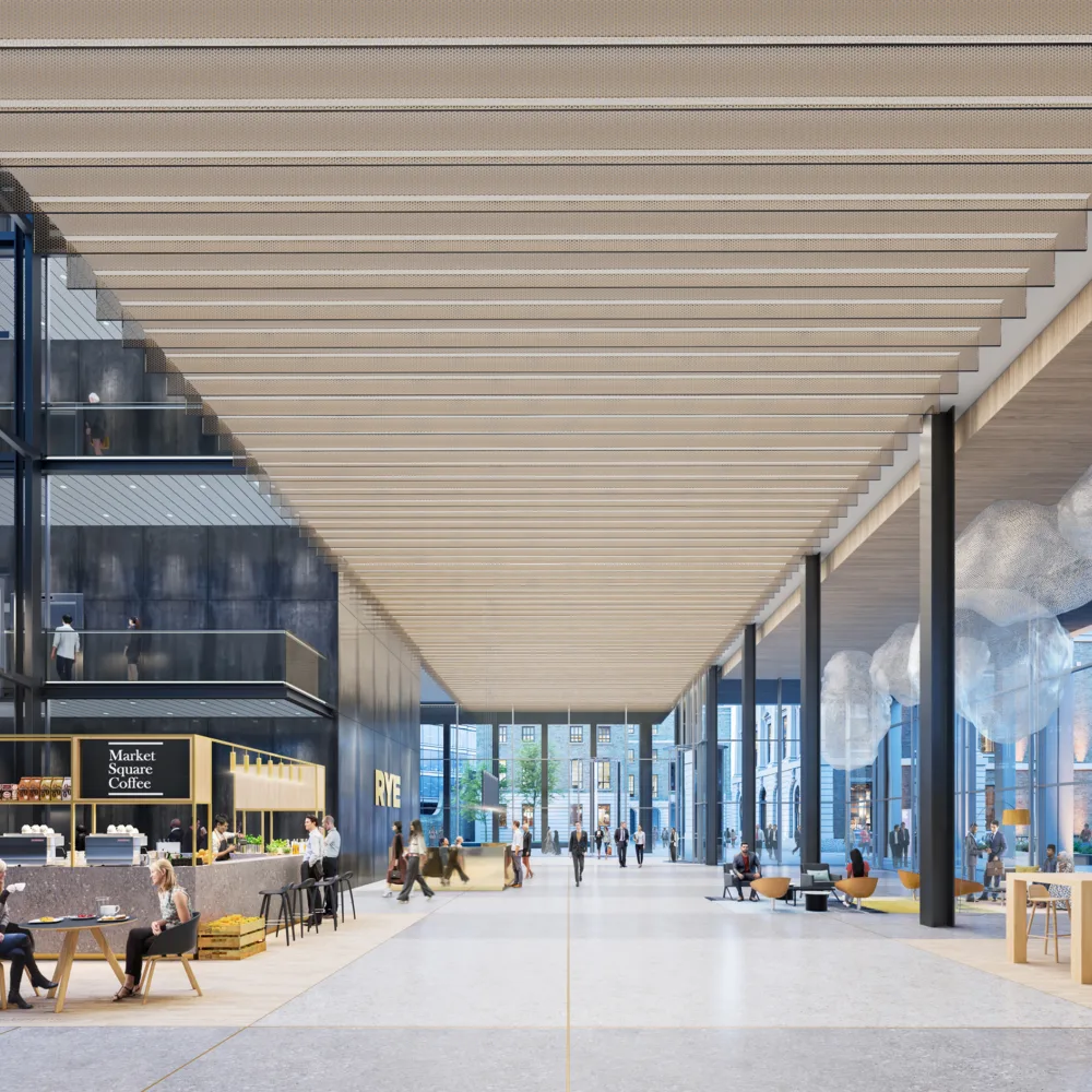 Foyer interior with cafe and meetings spaces full of people at the Royal Mint Court, London