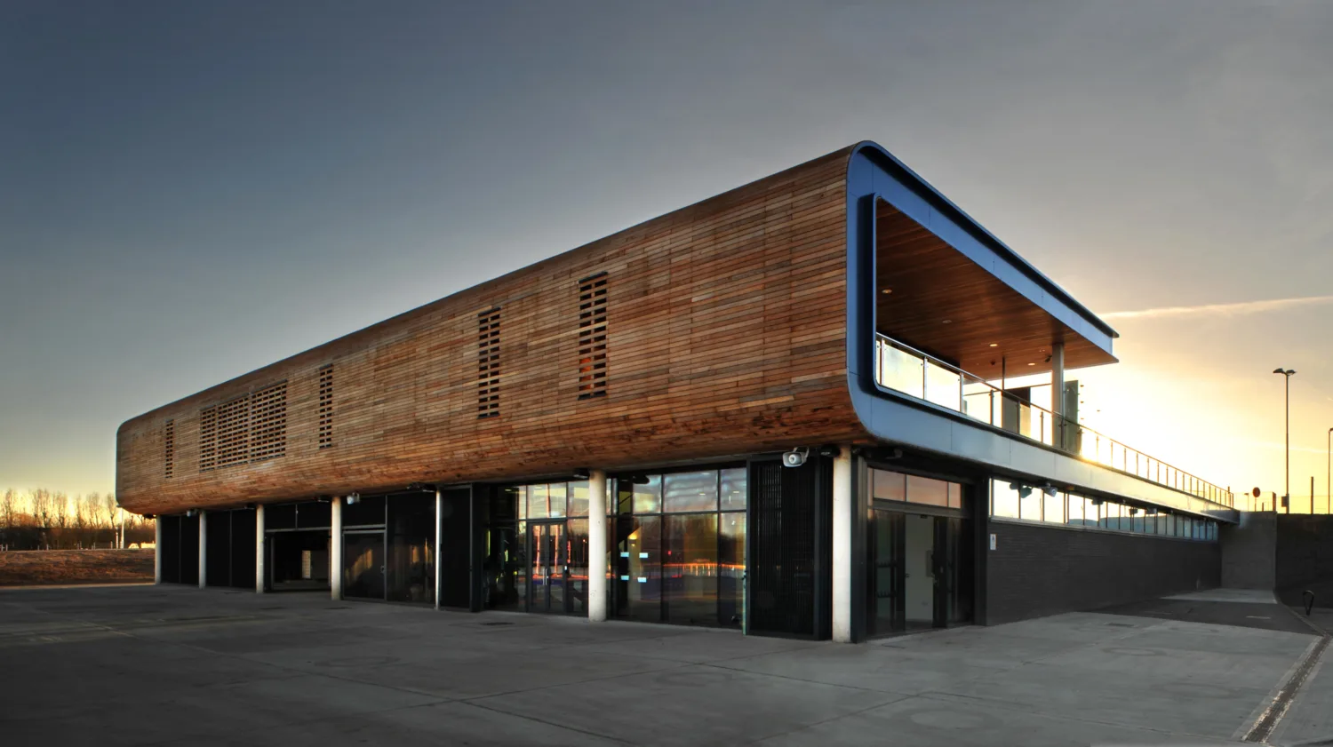 Exterior of the Broxbourne Lee Valley WWC wooden building with glass base
