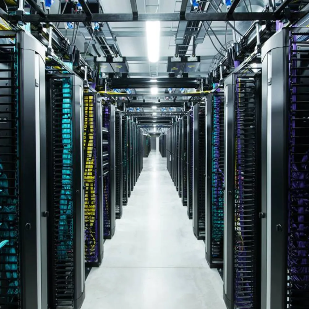Look down the aisle of a server room