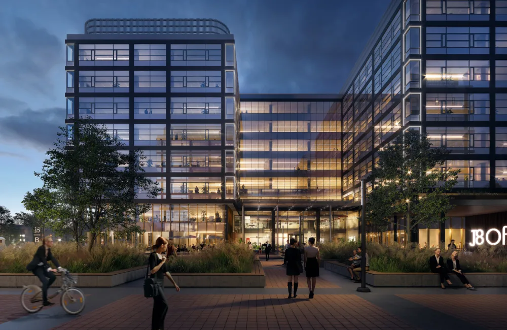 J8 Office Park exterior with landscaping and evening lighting
