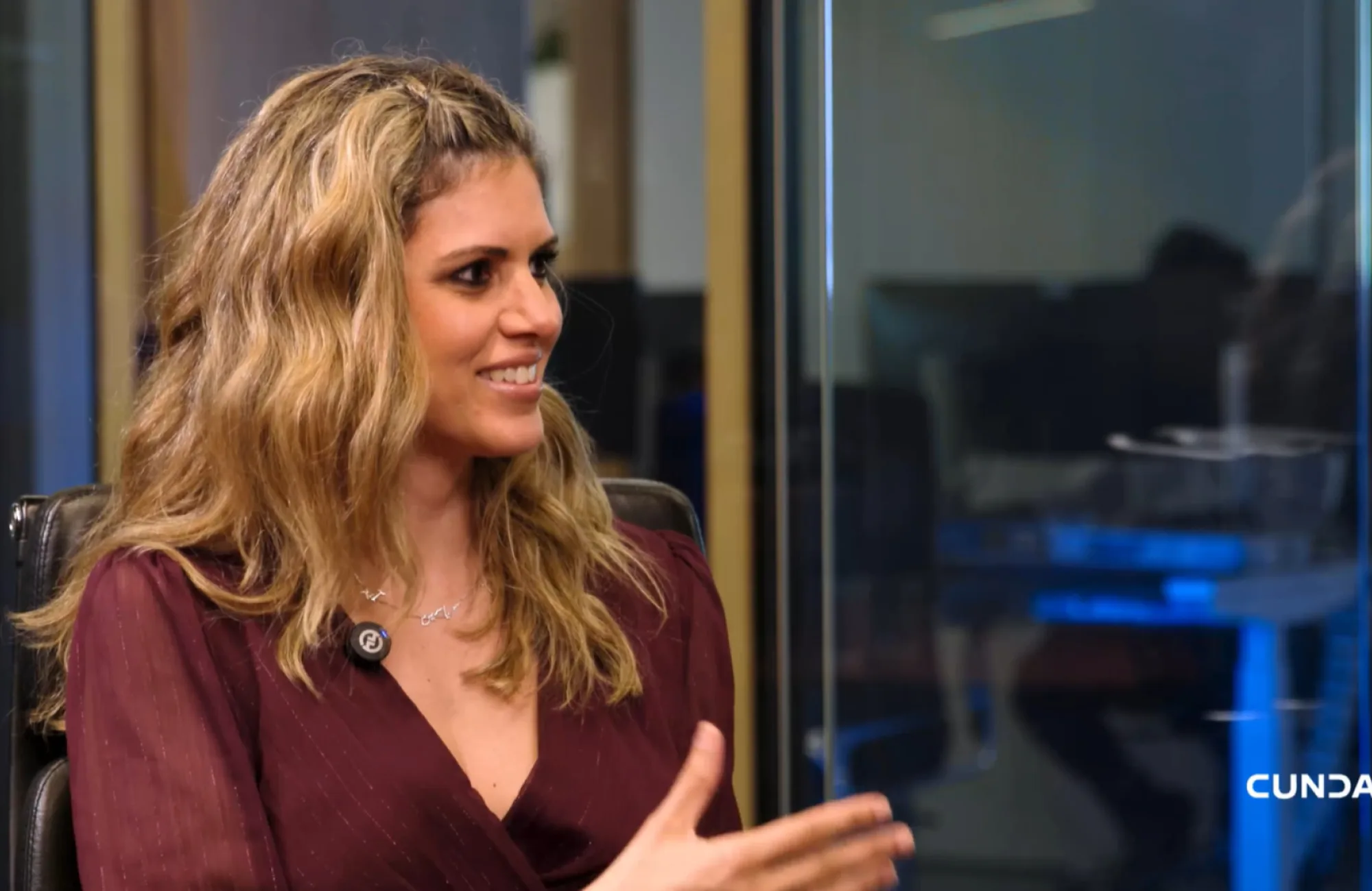 Laila Al-Yousef smiling while being interviewed in our Dubai office.