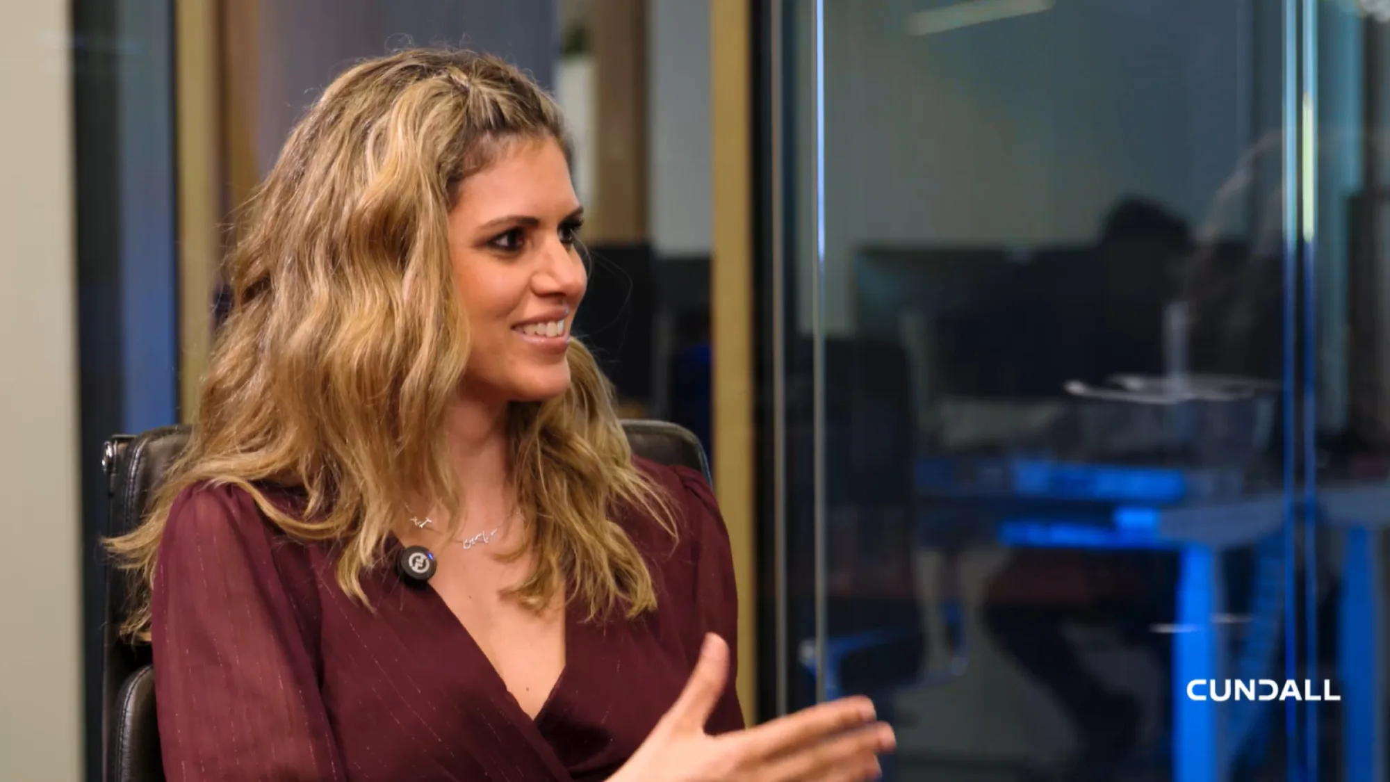 Laila Al-Yousef smiling while being interviewed in our Dubai office.