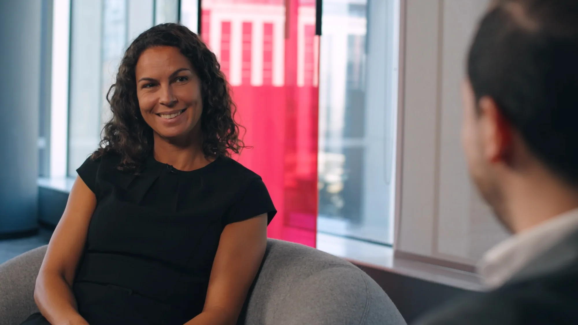 Sarah French smiling with Mario Saab during the recording of our Cundall Conversations Sustainability campaign