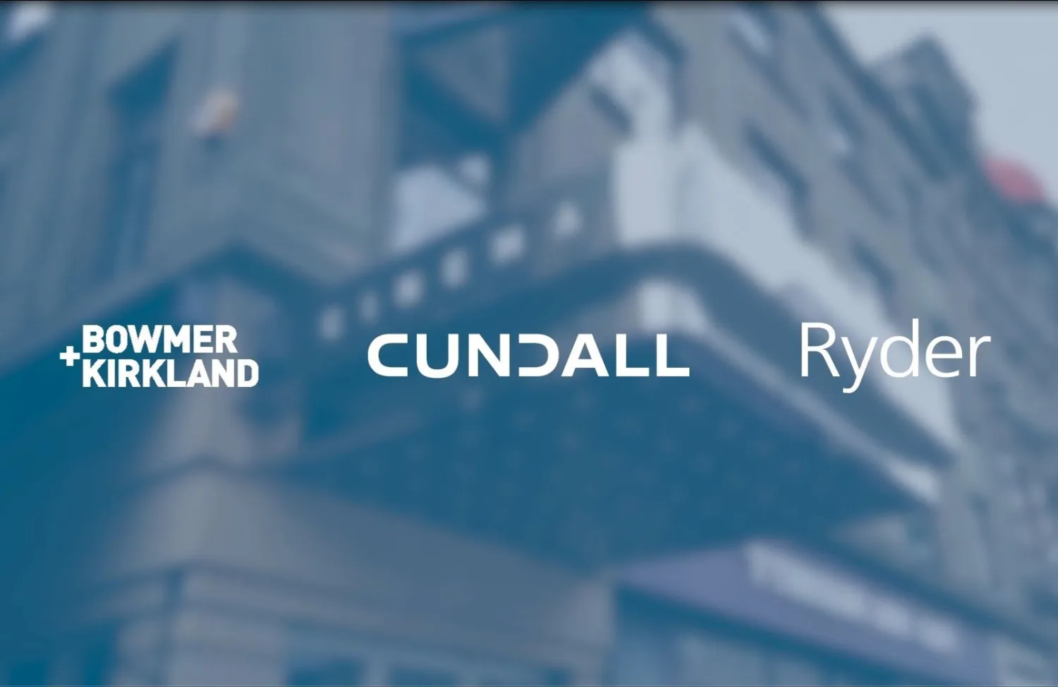 blurred image of a building with a blue tint and Bowmer + Kirkland, Cundall and Ryder logos