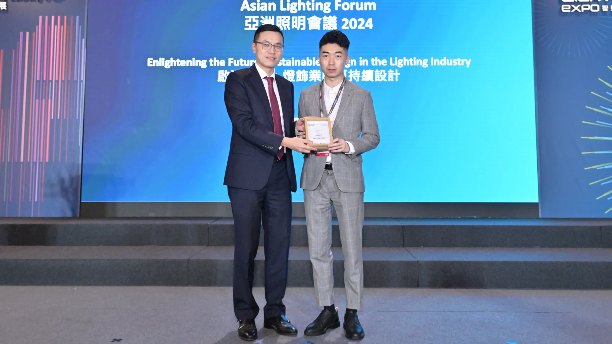 Pete Shing receiving a plaque during the HKTDC Asian Lighting Forum 2024 event