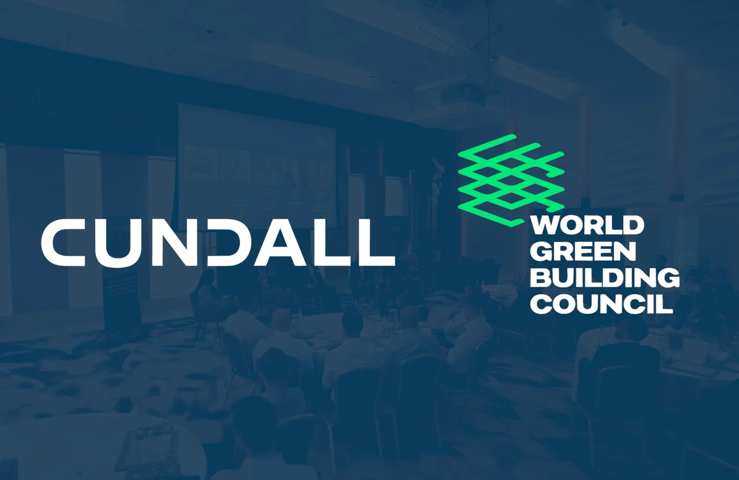 Cundall and World Green Building Council logos over a conference event scene with seated attendees and a presentation screen in the background.