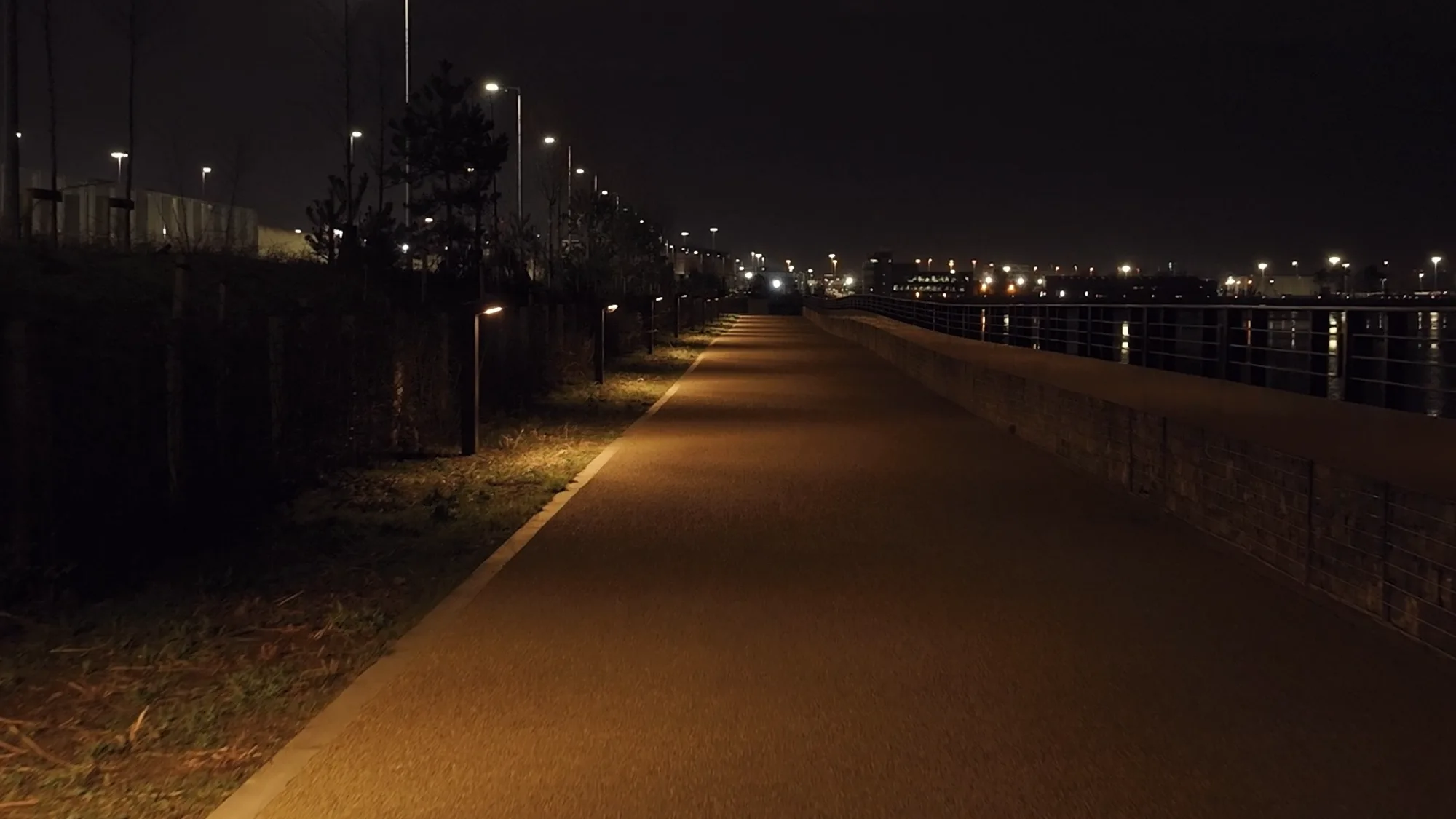 Drone slow motion shot of the lighting on one of the paths at Dublin Port Greenway