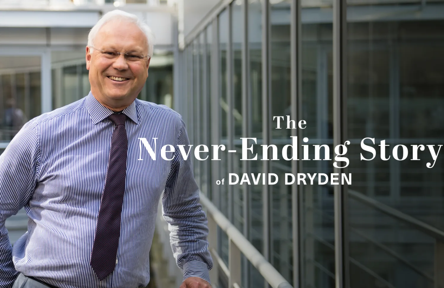 David Dryden posing in front of glazed windows