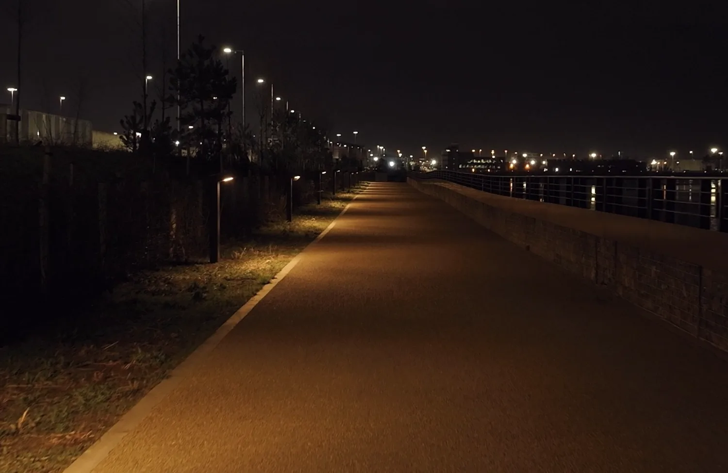 Drone slow motion shot of the lighting on one of the paths at Dublin Port Greenway