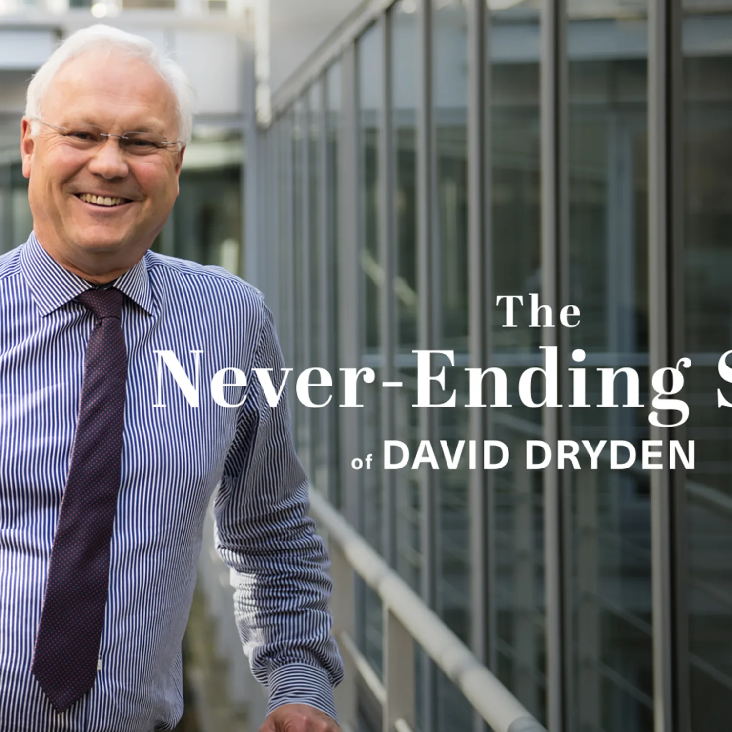 David Dryden posing in front of glazed windows